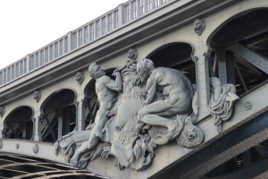 Statues of a bridge in the Seine River in Paris