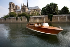 Boat on the Seine River in front of Nostre Dame De Paris
