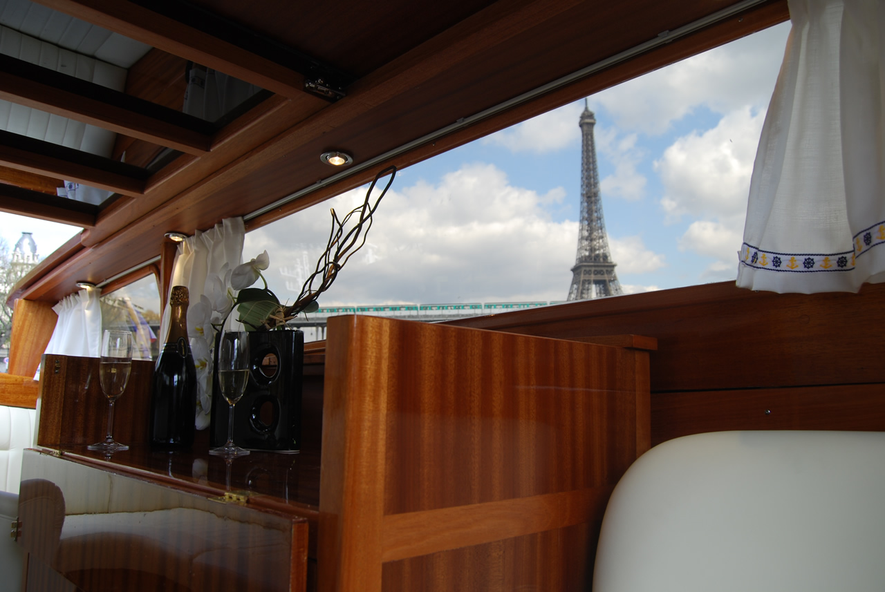 View of the Effeil Tower in Paris from a boat tour